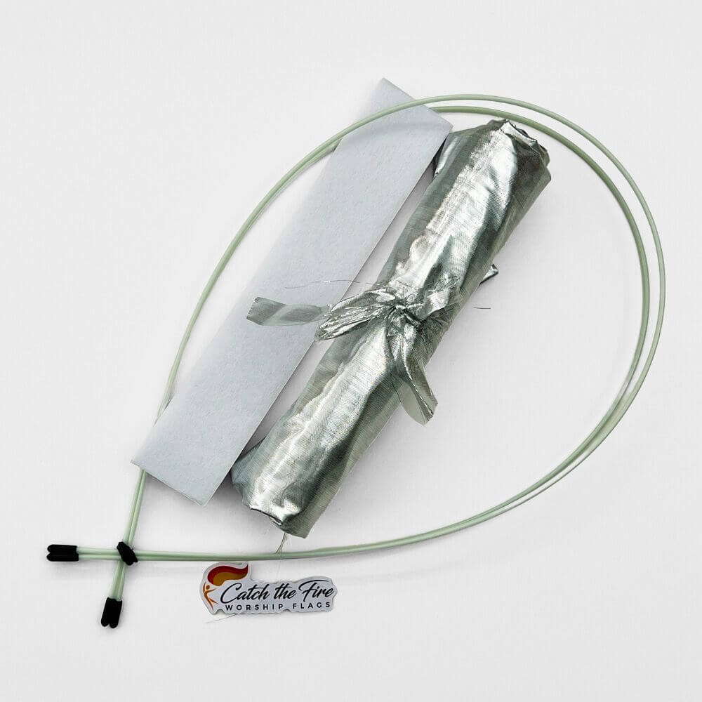 Silver metallic DIY worship flag kit with pre-cut fabric, pole pocket lining, and flexible quiver poles—symbolizing redemption, wisdom, and refinement.