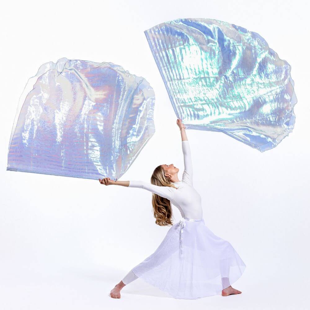 Holy & Blameless iridescent worship flags raised in stillness, showing double-layer design. A visual declaration of holiness and anointing through prophetic movement.