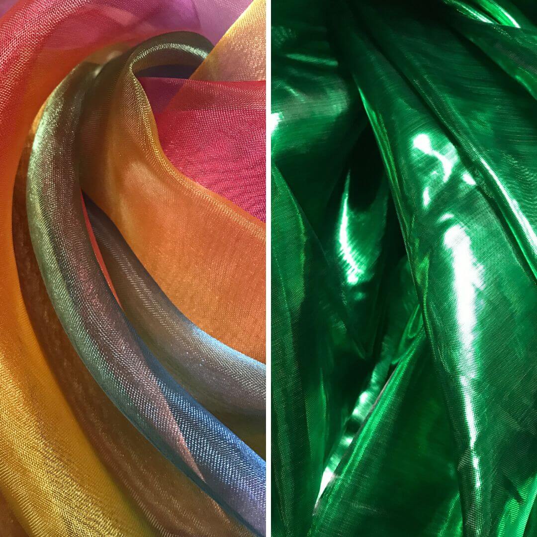 Close-up of vibrant sheer worship flag fabrics in rainbow tones and metallic green, highlighting shimmer texture and color variety for DIY flag making