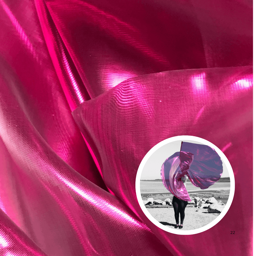 Close-up of vibrant hot pink metallic fabric with inset image of a person waving a matching worship flag in dynamic movement.
