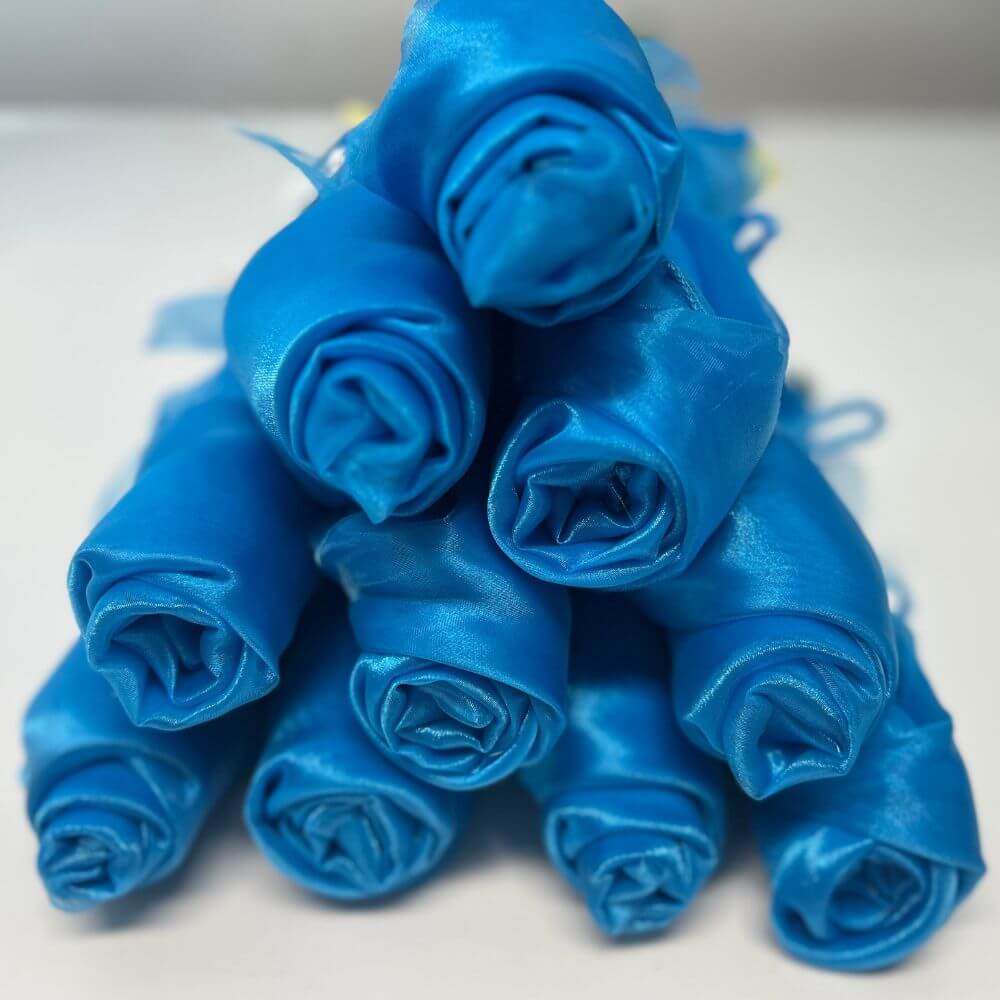 Bundle of 10 light blue sheer pre-cut angel wing fabric pairs for DIY worship flags – reflecting the heavens, sonship, and honor.
