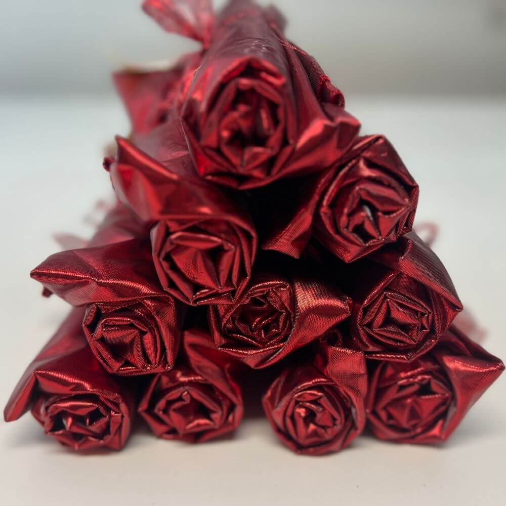 Bundle of 10 red metallic pre-cut angel wing fabric pairs for DIY worship flags – representing the blood of Jesus, atonement, and life.