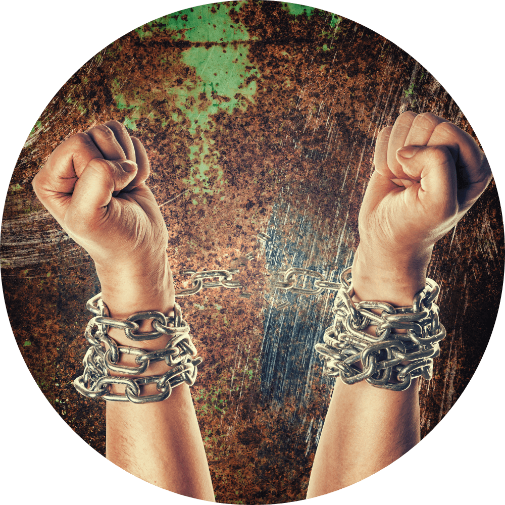 chains breaking from a worshipper's wrist to mark freedom through worship intercession