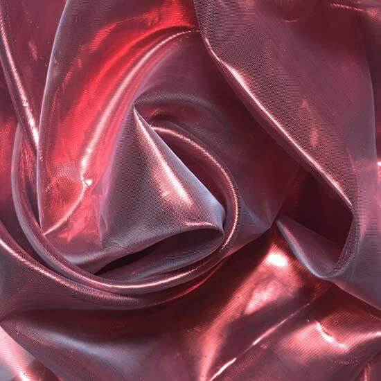 Close-up of shimmering red metallic fabric, ideal for flowing dance flags in worship and praise dance.