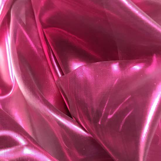 Close-up of shimmering scarlet pink sheer fabric used in worship flags, highlighting its iridescent texture and vibrant prophetic color.