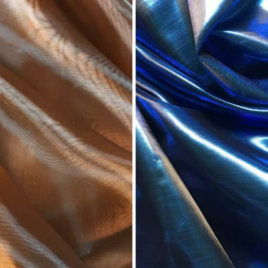 Close-up of iridescent worship flag fabrics in bronze and royal blue, showcasing the shimmer and texture of the lightweight, flowing material.