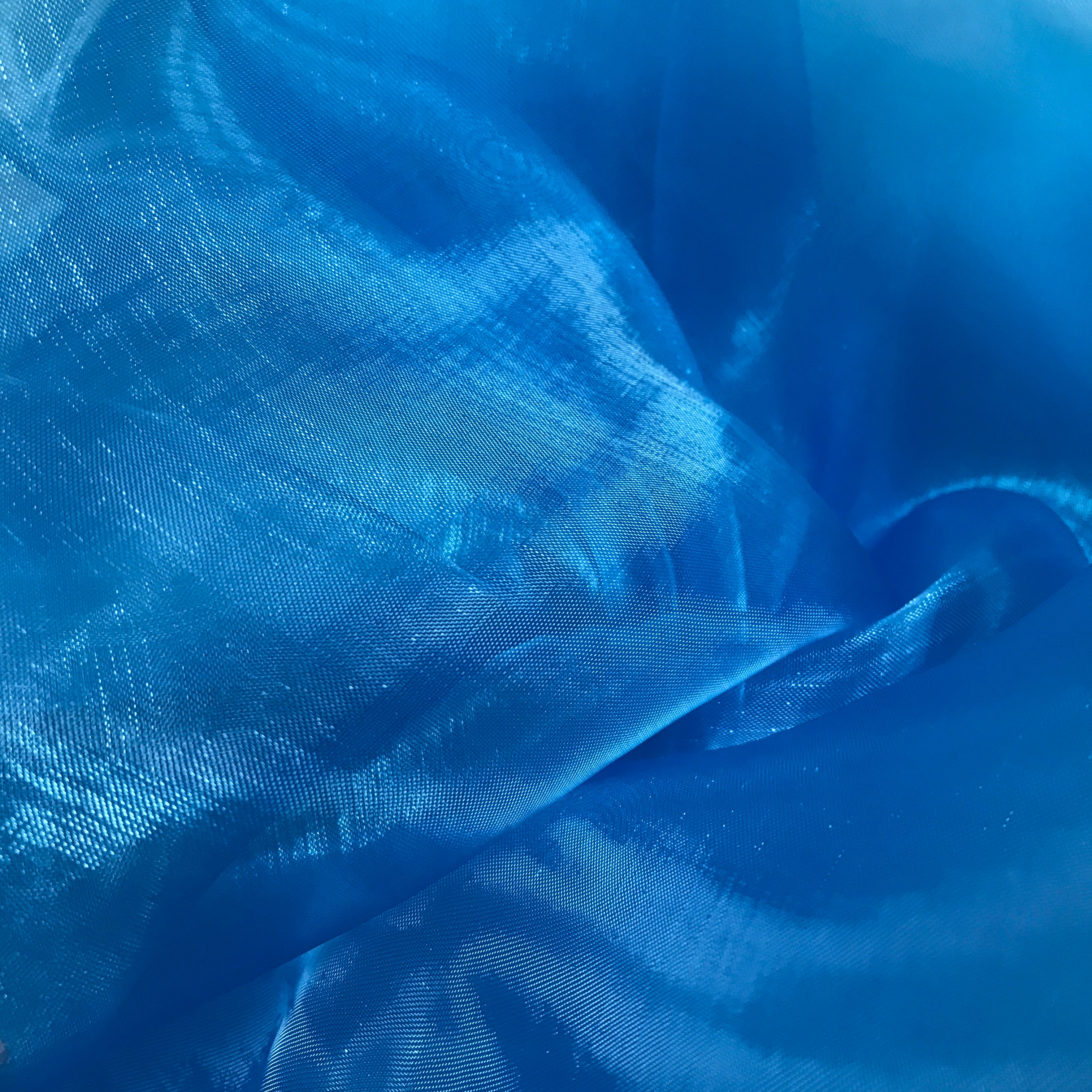 Blue shimmer pre-cut fabric for DIY praise & worship flags; perfect for layering and beginners. 