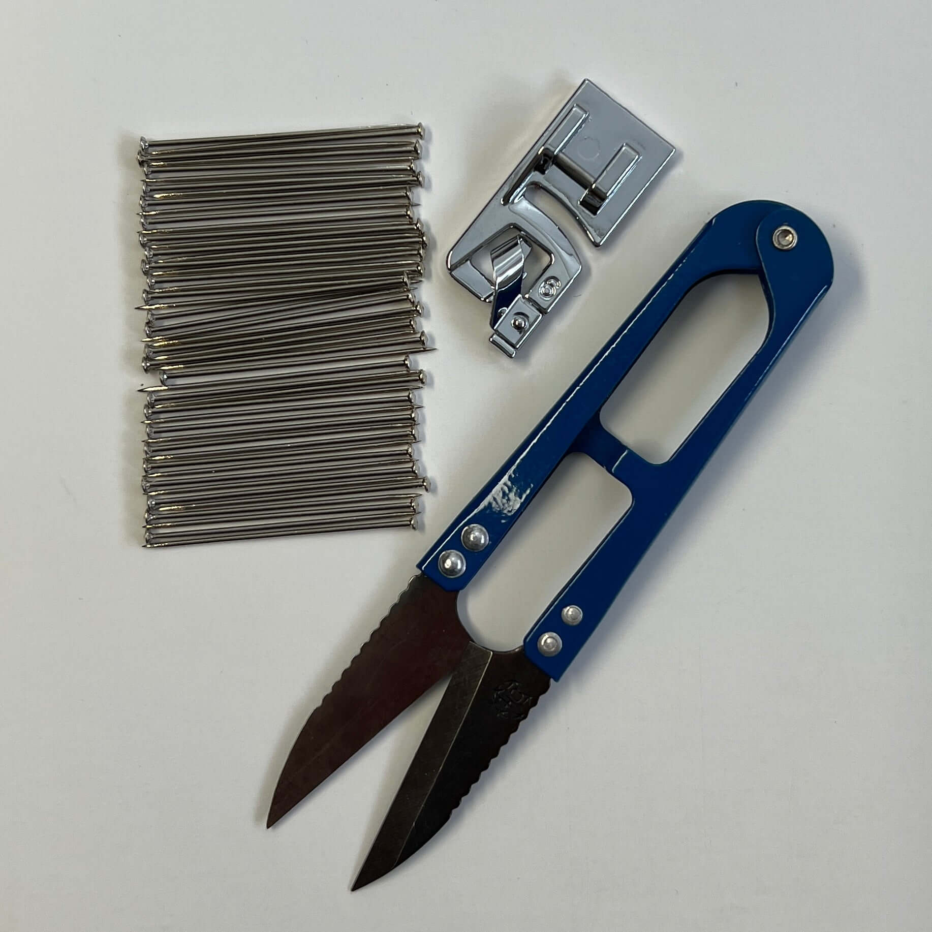 DIY worship flag making kit with straight pins, rolled hem foot, and thread snips for sewing your own praise and worship flags.