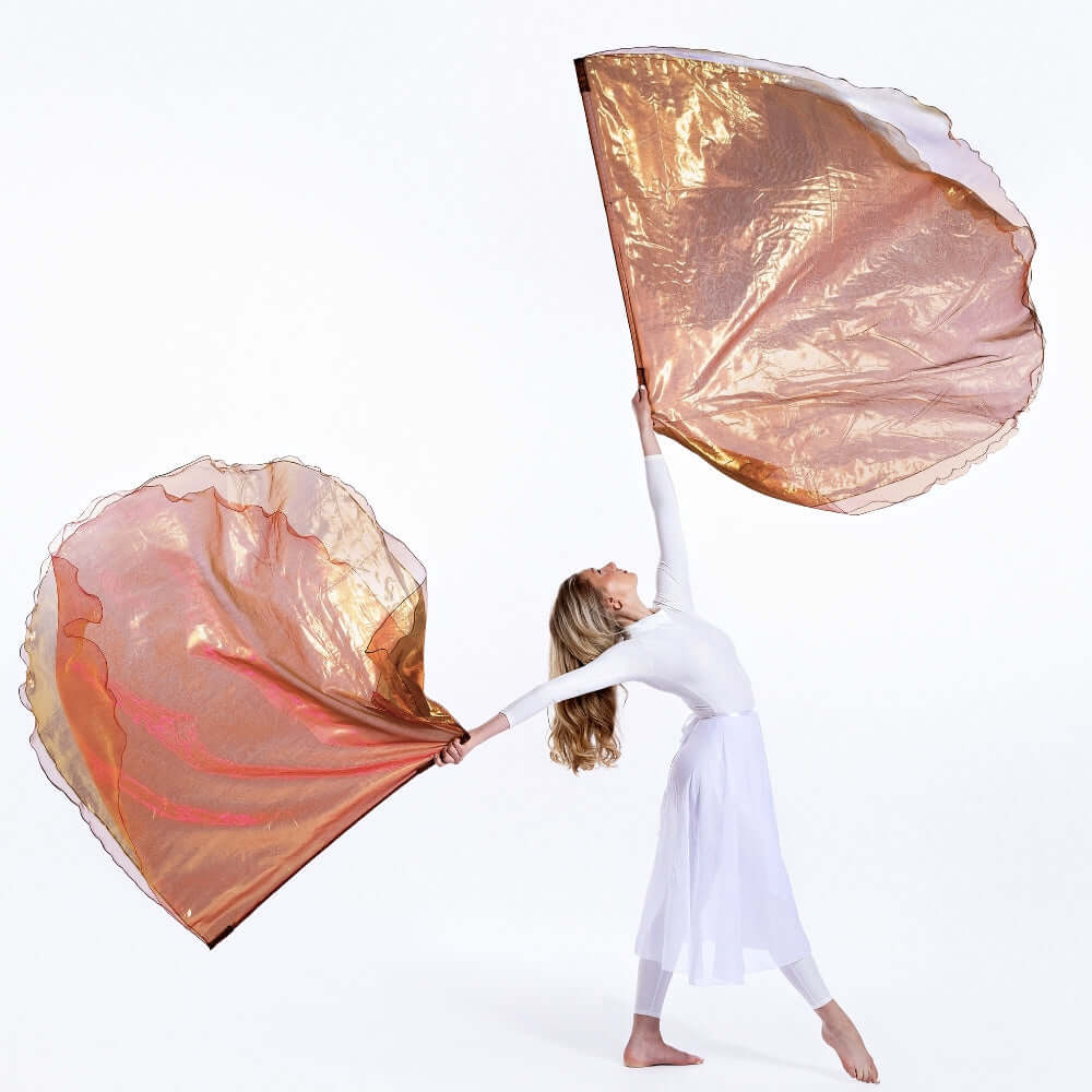 Praise dancer extends both arms with triple-layer Jehovah Sabaoth worship flags in motion—designed for spiritual warfare and prophetic declaration.