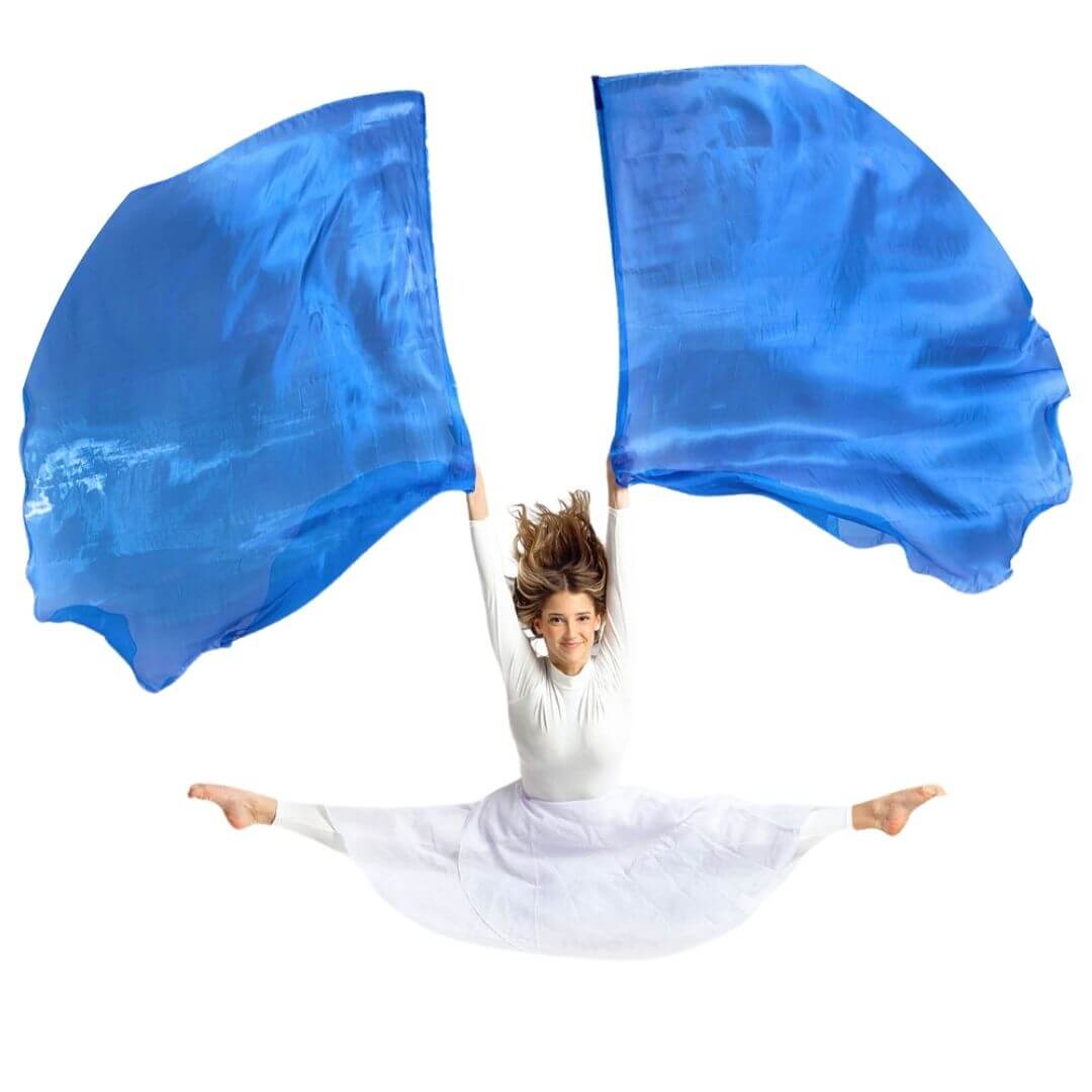 Joyful worship dancer leaping with vibrant blue worship flags, expressing praise and freedom through creative movement.