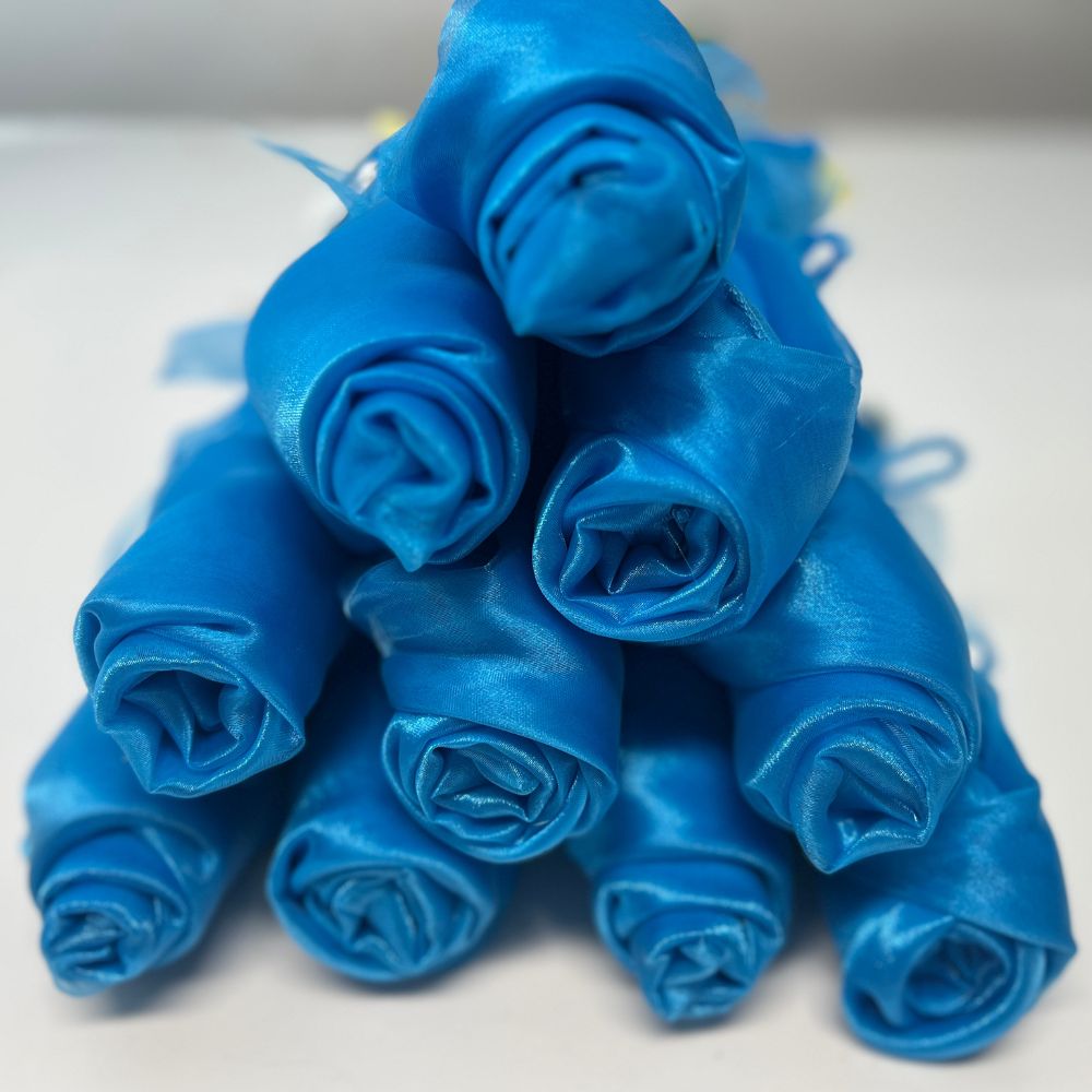 Bundle of 10 light blue sheer pre-cut angel wing fabric pairs for DIY worship flags – reflecting the heavens, sonship, and honor.
