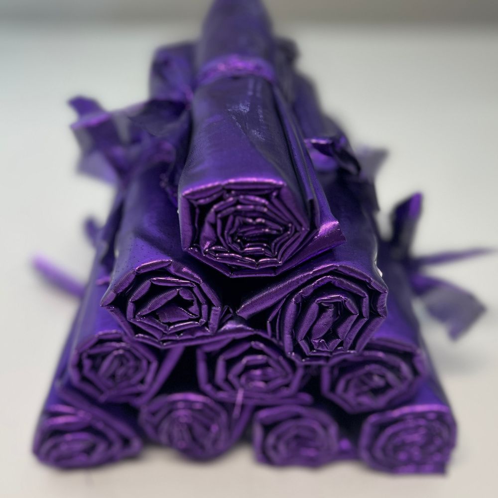 Bundle of 10 purple metallic pre-cut angel wing fabric pairs for DIY worship flags – symbolizing authority, kingship, royalty, and worship.